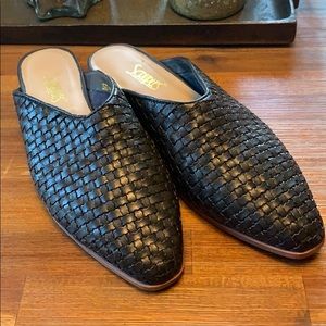 Woven leather mules.